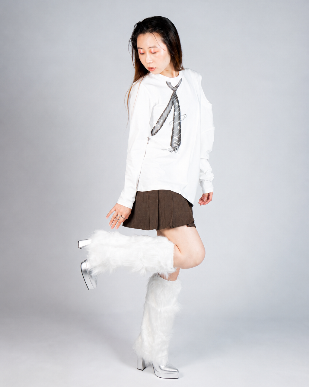 Model wearing MINASEONG white dual-neck tie long sleeve T-shirt from the AW26 collection