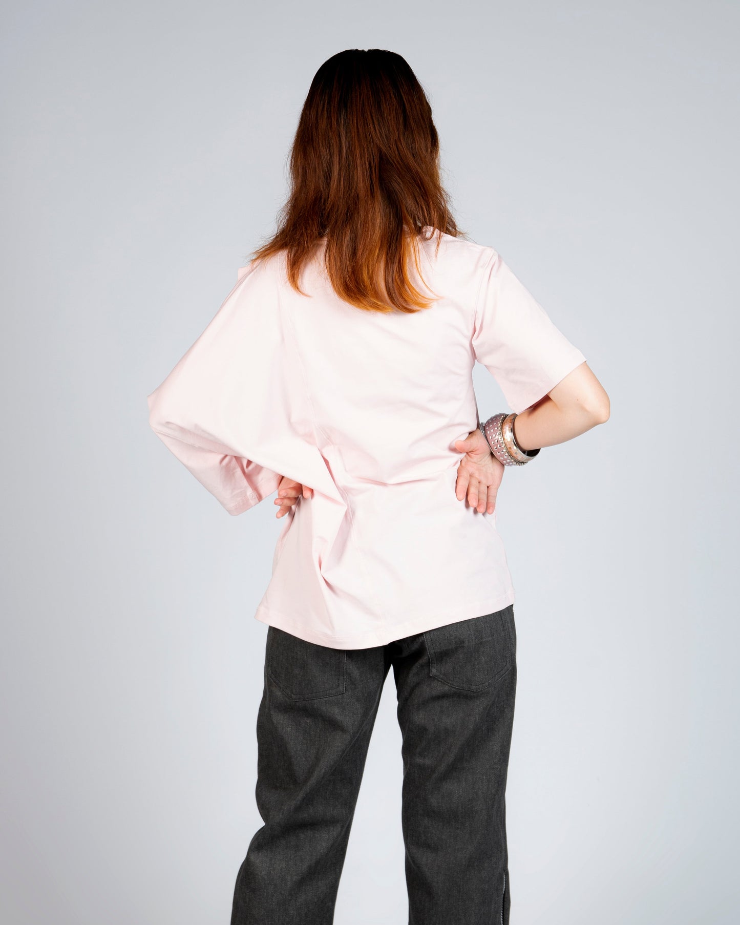 Back view of MINASEONG baby pink dual-neck short sleeve T-shirt