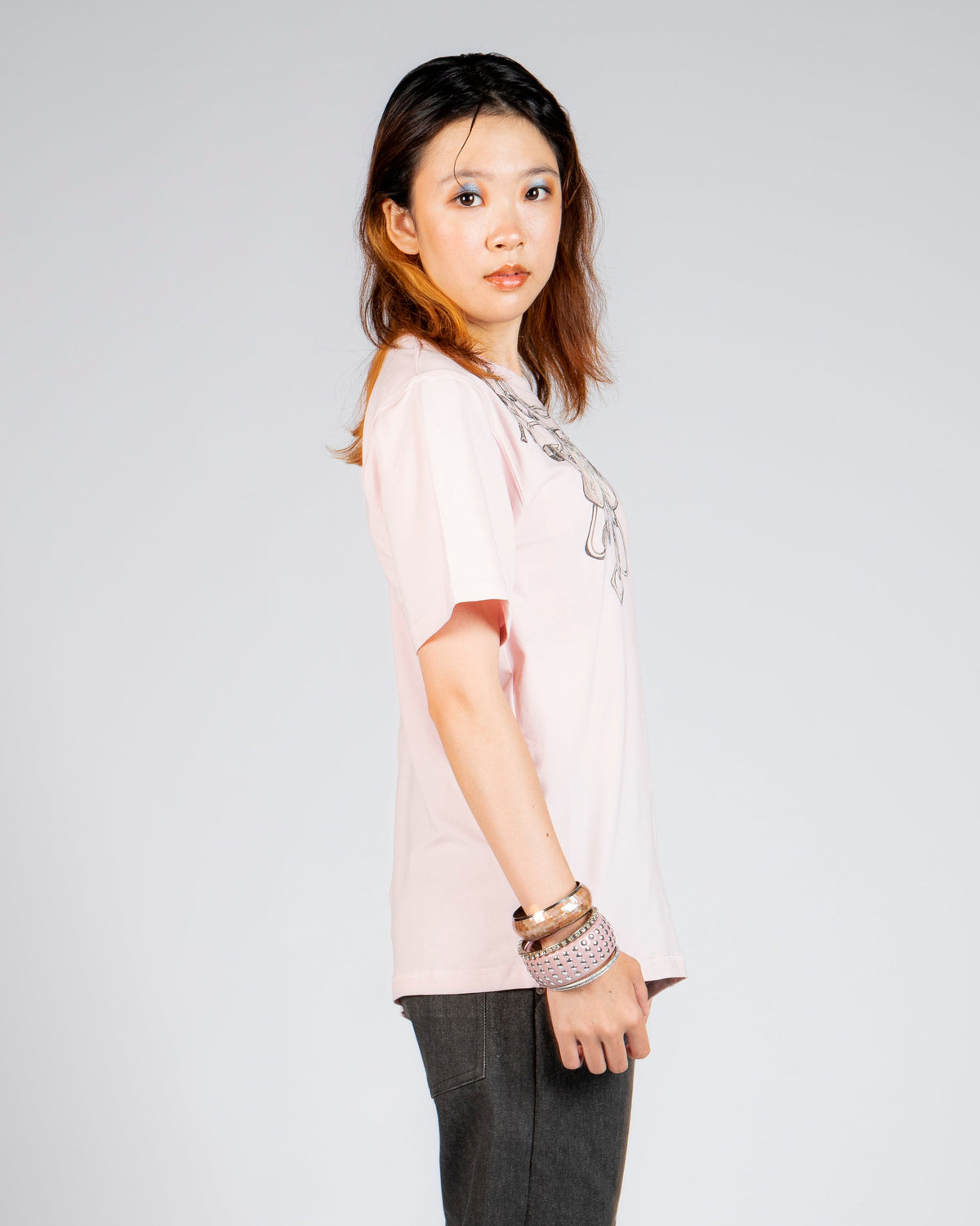 Left side view of MINASEONG baby pink dual-neck short sleeve T-shirt