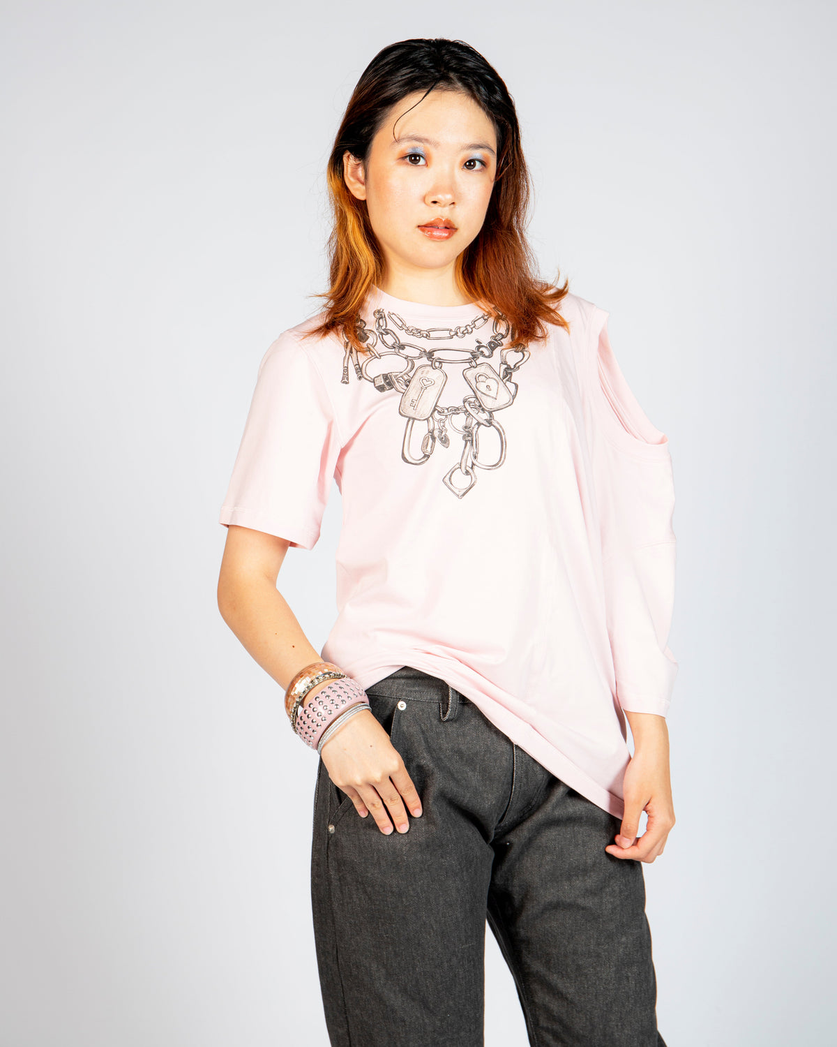Front view of MINASEONG baby pink dual-neck T-shirt with chain and lock graphic
